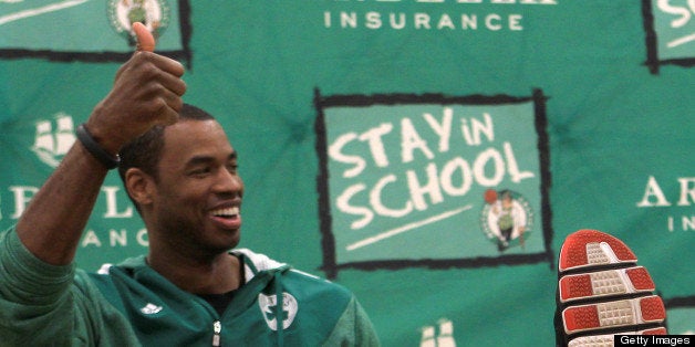 BOSTON - JANUARY 8: Students tried to guess what size Jason Collins' shoe size was, for a prize. The correct answer was 17. The Boston Celtics host the 'Stay In School' assembly with students at the Murphy K-8 school in Dorchester. The special assembly honored high-achieving students and encouraged all of the children to take pride in their classroom work. They got to hang out with Celtics center Jason Collins, forward Jared Sullinger, former guard Keyon Dooling and legend Dana Barros. (Photo by David L Ryan/The Boston Globe via Getty Images)