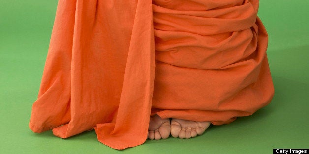 Buddhist Monk at Prayer