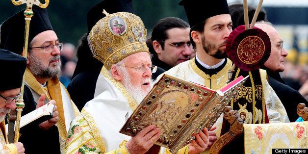The head of the Eastern Orthodox Church, Ecumenical Patriarch Bartholomew prays near the Golden Horn after a mass as part of celebrations of the Epiphany day at the Church of Fener Orthodox Patriarchiate in Istanbul, on January 6, 2011. The Orthodox faith uses the old Julian calendar in which Christmas falls 13 days after its more widespread Gregorian calendar counterpart on December 25. AFP PHOTO / MUSTAFA OZER (Photo credit should read MUSTAFA OZER/AFP/Getty Images)