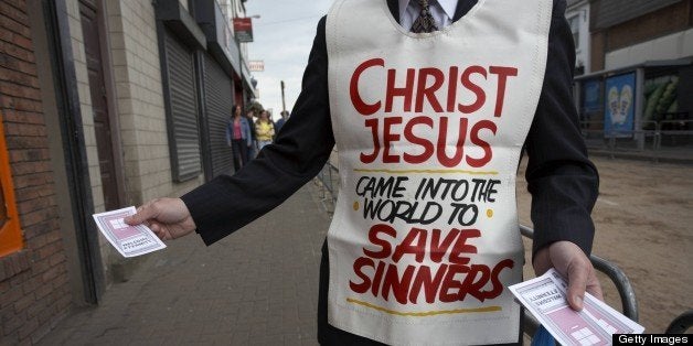 christian religious fundamentalist handing out leaflets in the main street at the ballyclare may fair