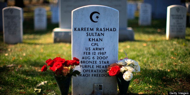 Kareem Rashad Sultan Khan was invoked by Gen. Colin Powell in his endorsement of Sen. Barack Obama on Sunday+=s 'Meet the Press.' Khan, 20, is one of four Muslim soldiers killed in Iraq and Afghanistan and buried in Arlington National Cemetery. Powell said a photo of Khan+=s tombstone, with a crescent and star, was a reminder that Muslims shouldn't be considered any less American than others, as has often happened in this campaign. (Photo by Chuck Kennedy/MCT/MCT via Getty Images)