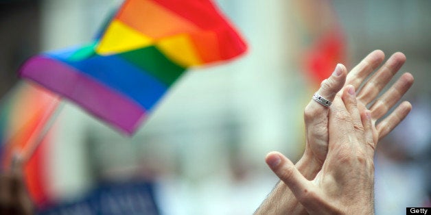 LGBT rinbow flag and clapping hands.