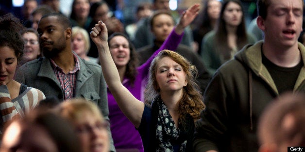 HAVERILL, MA - DECEMBER 12: Students sing and pray during chapel at Zion Bible College, December 12, 2012 in Haverill, Massachusetts. The college, part of the the Assemblies of God USA, teaches and trains students for the Pentecostal ministry. As of January 2013, the college will be renamed Northpoint Bible College. College admission has doubled from 200 students to the current 402 students. Chapel is held Mondays through Thursdays. (Photo by Melanie Stetson Freeman/The Christian Science Monitor via Getty Images)