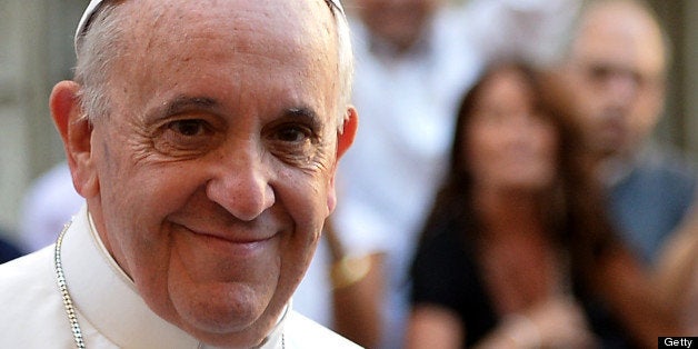 ALTERNATIVE CROP Pope Francis salutes as he arrives at the Chiesa Del Gesu' in Rome on July 31, 2013. The Pontiff celebrates a mass for St. Ignatius of Loyola, founder of the Society of Jesuits. AFP PHOTO / ALBERTO PIZZOLI (Photo credit should read ALBERTO PIZZOLI/AFP/Getty Images)