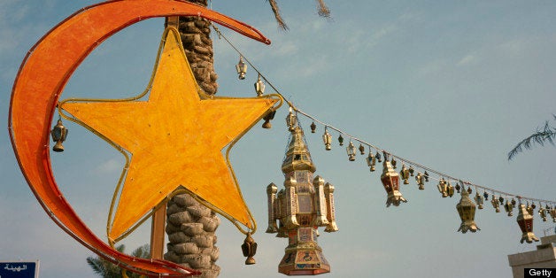 Kuwait, Kuwait City, Gulf Road. Crescent moon and lantern decorations for Eid at the end of Ramadan.