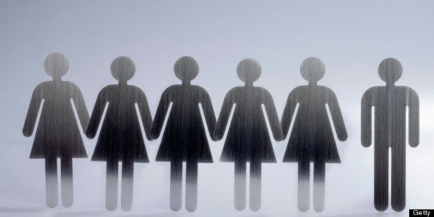 Five female restroom sign figures in a row and one male restroom sign figure