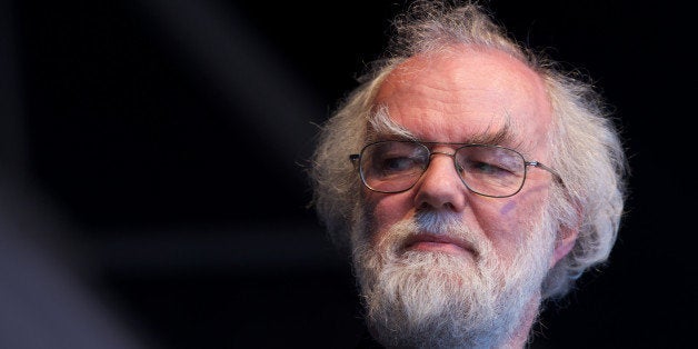 Former Archbishop of Canterbury Rowan Williams speaks at the 'Big IF' rally to call for G8 action on the causes of hunger in the world in Hyde Park in central London on June 8, 2013. Thousands of people gathered in the capital's Hyde Park for the anti-hunger demonstration, hosted by lobby group Enough Food For Everyone If with speakers that included British filmmaker Danny Boyle and Microsoft billionaire Bill Gates. AFP PHOTO / ANDREW COWIE (Photo credit should read ANDREW COWIE/AFP/Getty Images)