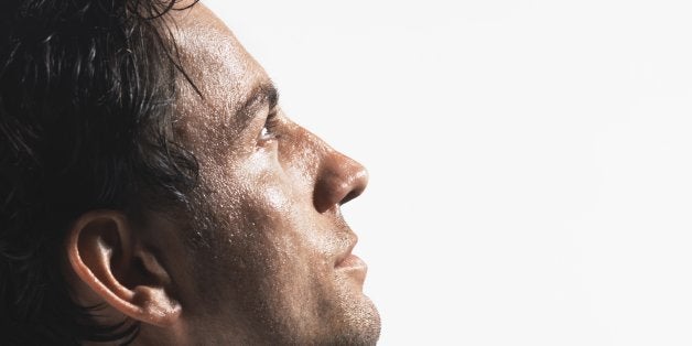 Tired Young Businessman staring into space, profile