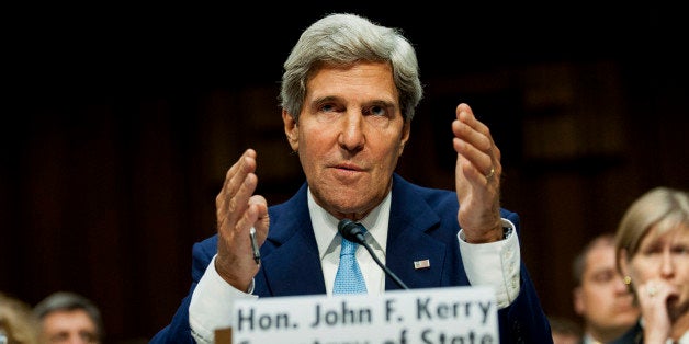 John Kerry, U.S. secretary of state, testifies at a Senate Foreign Relations Committee hearing on Syria in Washington, D.C., U.S., on Tuesday, Sept. 3, 2013. Kerry told lawmakers that President Obama 'has no intention' of putting American troops on the ground in Syria. Photographer: Pete Marovich/Bloomberg via Getty Images 