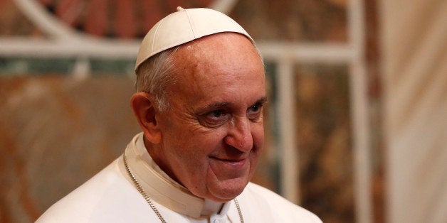 Pope Francis looks on during an audience with the diplomatic corps at the Vatican on March 22, 2013. Pope Francis called for the Roman Catholic Church to 'intensify' its dialogue with Islam, echoing hopes in the Muslim world for better ties with the Vatican during his reign. AFP PHOTO POOL / TONY GENTILE (Photo credit should read TONY GENTILE/AFP/Getty Images)