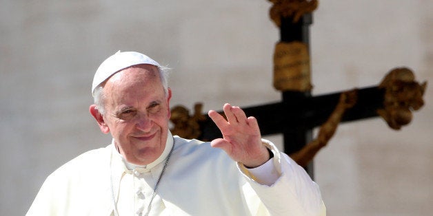 VATICAN CITY, VATICAN - SEPTEMBER 18: Pope Francis attends his weekly General Audience in St. Peter's Square on September 18, 2013 in Vatican City, Vatican. Pontiff called on Catholics together with other Christians to continue to pray for peace in the most trouble parts of the world. (Photo by Franco Origlia/Getty Images)