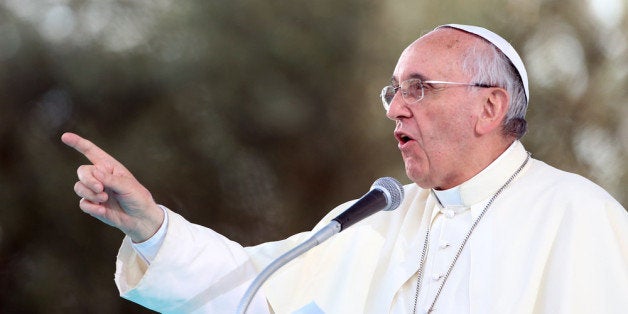 CAGLIARI, ITALY - SEPTEMBER 22: Pope Francis delivers his speech during a meeting with young people on September 22, 2013 in Cagliari, Italy. Pope Francis heads to Cagliari on the Italian island of Sardinia for a pastoral visit that includes celebrating mass at the Sanctuary of Our Lady of Bonaria. The Pope announced in May that he wished to visit the Marian Shrine of Bonaria or 'Good Air' because it gave his hometown of Buenos Aires its name. During his 10-hour visit to the city of Cagliari, the Pope will also meet workers, business representatives, prisoners, the poor, young people, leading representatives from the world of culture and the island's Catholic bishops. (Photo by Franco Origlia/Getty Images)