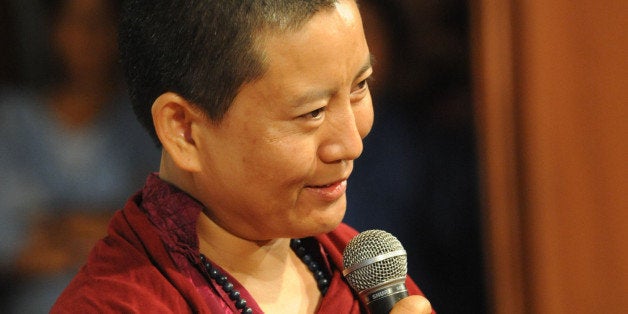 Buddhist Nun and Nepalese musician Ani Choying Drolma performs during the 40th Anniversary of the Self Employed Women's Association (SEWA) in Ahmedabad on April 25, 2012. SEWA, founded in 1972 by Gandhian and civil rights activist Ela Bhat, is a trade union in support of marginalised, self-employed women in India. AFP PHOTO / Sam PANTHAKY (Photo credit should read SAM PANTHAKY/AFP/Getty Images)