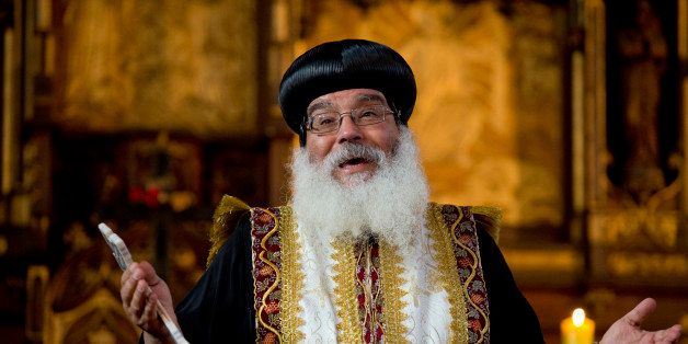 Leader of the Coptic Orthodox church in Germany, Bishop Anba Damian leads worshippers in prayer during a service for Coptic Christians in Egypt at the Coptic Orthodox church in Berlin on August 22, 2013. AFP PHOTO / ODD ANDERSEN (Photo credit should read ODD ANDERSEN/AFP/Getty Images)