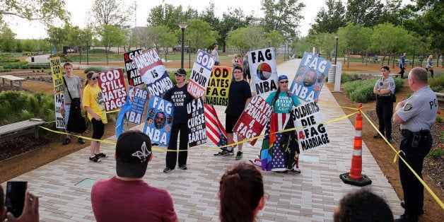 OKLAHOMA CITY, OK - MAY 01: Members of the Westboro Baptist Church protest outside of the Chesapeake Energy Arena before Game Five of the Western Conference Quarterfinals of the 2013 NBA Playoffs between the Oklahoma City Thunder and the Houston Rockets on May 1, 2013 in Oklahoma City, Oklahoma. NOTE TO USER: User expressly acknowledges and agrees that, by downloading and or using this photograph, User is consenting to the terms and conditions of the Getty Images License Agreement. (Photo by Christian Petersen/Getty Images)