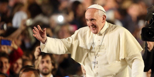 VATICAN CITY, VATICAN - OCTOBER 26: Pope Francis leaves after a meeting of prayer with families at St. Peter's Square on October 26, 2013 in Vatican City, Vatican. Speaking in St. Peter's Square to thousands of families gathered to celebrate a weekend Family Pilgrimage to the Tomb of St. Peter, Pope Francis invited all generations to come together and live the joy of Faith. (Photo by Franco Origlia/Getty Images)