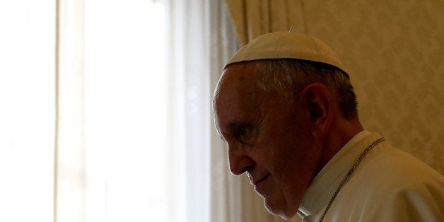 VATICAN CITY, VATICAN - NOVEMBER 18: Pope Francis attends an audience with Bahamas Prime Minister at his studio on November 18, 2013 in Vatican City, Vatican. During his Sunday Angelus Pope Francis prescribed 'Misericordina' medicine to faithul gathered in St. Peter's square. Thousands of boxes meant to look like a medicne box named 'Misericordina' were handed out to pilgrims and contained a Rosary, an image of Christ and a leaflet. (Photo by Franco Origlia/Getty Images)