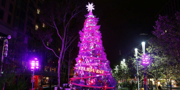 MELBOURNE, AUSTRALIA - DECEMBER 08: The lights on a large Christmas tree are seen at Christmas Square on December 8, 2013 in