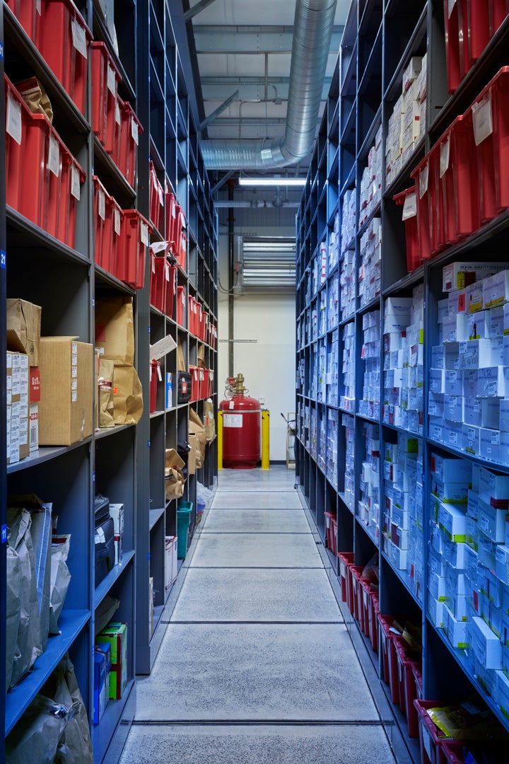 Boxes containing rape kits, right, in the evidence storage building at the Virginia Beach Police Department on Jan. 16, 2018.