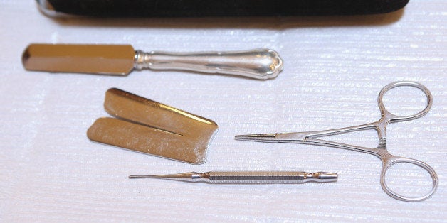 BERLIN, GERMANY - MARCH 03: Instruments used in the Jewish circumcision ceremony lie on a table prior to the circumcision of
