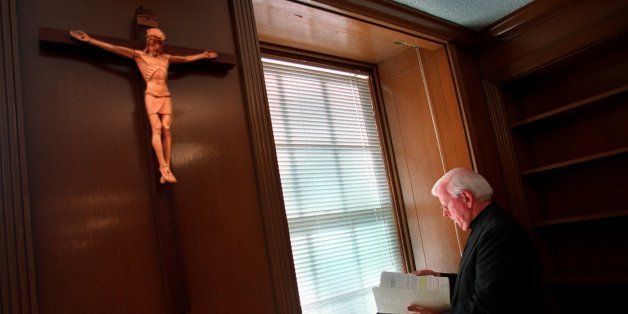 BOSTON - AUGUST 31: Father Robert Nugent, who was silenced by the Vatican, prepares for his speech tonight. He was photographed at the Paulist Center. (Photo by Suzanne Kreiter/The Boston Globe via Getty Images)