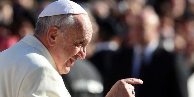 VATICAN CITY, VATICAN - DECEMBER 04: Pope Francis arrives in St. Peter's square for his weekly audience on December 4, 2013 in Vatican City, Vatican. At the end of his General Audience Pontiff called on everyone to pray for a group of nuns taken by force from the Greek Orthodox Monastery of Saint Tecla in the ancient Christian town of MaÕlula in Syria. (Photo by Franco Origlia/Getty Images)