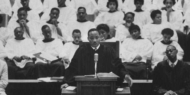 Rev. Martin Luther King Jr. (L) preaching in his church. (Photo by Donald Uhrbrock//Time Life Pictures/Getty Images)