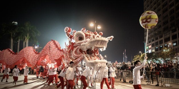 Performers display a dragon dance during a Chinese New Year parade in Hong Kong on January 31, 2014. Chinese communities acro