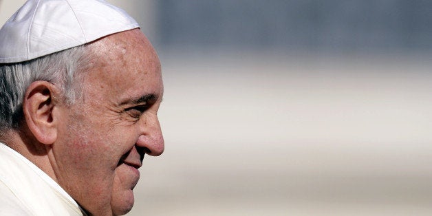 Pope Francis holds his weekly general audience on March 5, 2014 at St.Peter's square in Vatican city. The pontiff today has defended the Catholic Church's record on tackling the sexual abuse of children by priests, saying 'no-one else has done more' to root out paedophilia. AFP PHOTO / ANDREAS SOLARO (Photo credit should read ANDREAS SOLARO/AFP/Getty Images)