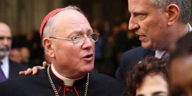 NEW YORK, NY - OCTOBER 14: Democratic New York City mayoral candidate Bill de Blasio stands with Cardinal Timothy Dolan while marching in the 69th Annual Columbus Day Parade on October 14, 2013 in New York City. With dozens of floats, marching bands and politicians on hand, the annual celebration of Italian American culture and heritage draws large crowds along 5th Avenue. (Photo by Spencer Platt/Getty Images)