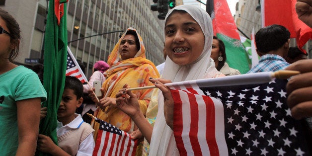 NEW YORK - SEPTEMBER 26: Participants wait for the start of the American Muslim Day Parade on September 26, 2010 in New York, New York. The annual parade celebrates the presence and contributions of Muslims in New York City and surrounding areas. The parade, which attracts hundreds of participants, concludes with a bazaar selling food, clothing, and books from various Muslim nations. (Photo by Spencer Platt/Getty Images)