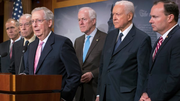 WASHINGTON, DC - OCTOBER 04: Senate Majority Leader Mitch McConnell (R-KY) (3rd L) joins Republican members of the Senate Judiciary Committee, including (L-R) Sen. Thom Tillis (R-NC), Chairman Charles Grassley (R-IA), Sen. John Cornyn (R-TX), Sen. Orrin Hatch (R-UT) and Sen. Mike Lee (R-UT), to discuss this week’s FBI investigation into Supreme Court nominee Judge Brett Kavanaugh during a news conference at the U.S. Capitol  October 04, 2018 in Washington, DC.  Calling Dr. Christine Blasey Ford’s allegations of sexual assault by Kavanaugh “outrageous,” GOP senators hope to move forward with a confirmation vote this weekend.  (Photo by Chip Somodevilla/Getty Images)