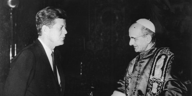 2nd July 1963: US statesman John F Kennedy, 35th president of the USA, during an audience with the newly-elected Pope Paul VI at the Vatican. Kennedy, on an official visit to Italy, is the first Roman Catholic to be elected president of the USA. (Photo by Keystone/Getty Images)