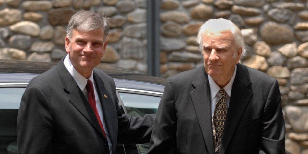 Franklin Graham, left, escorts his father Billy Graham prior to the funeral for their beloved Ruth Graham at Anderson Auditor