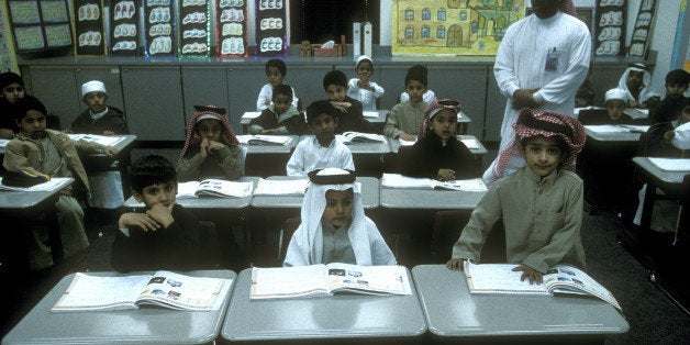 AL HUFUF, SAUDI ARABIA - JANUARY, 2003: Pupils work in class at The Prince Mohammed Bin Fahad Bin Abdulaziz School in the city of Halouf, a region rich in oil fields on January, 2003 in Al Hufuf, Saudi Arabia. In Saudi Arabia, school is free for the country's native population. (Photo by Reza/Getty Images)