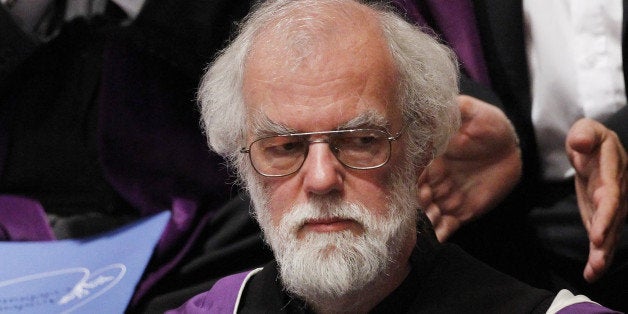 Former Archbishop of Canterbury Rowan Williams receives an honorary degree at St Andrews University in St Andrews, Fife, Scotland on September 13, 2013. Former US secretary of state Hillary Clinton made the graduation address during a ceremony in which she was given an honourary degree and the 600th anniversary of the founding of the University was marked. AFP PHOTO / POOL / DANNY LAWSON (Photo credit should read DANNY LAWSON/AFP/Getty Images)