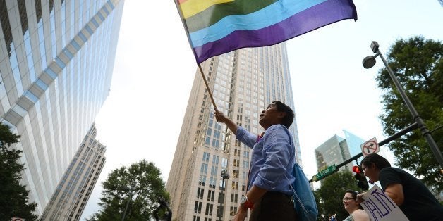 JR Joaquin joins marchers in Charlotte, North Carolina, on Wednesday, June 26, 2013, in celebration after the U.S. Supreme Court struck down the Defense of Marriage Act. (Jeff Siner/Charlotte Observer/MCT via Getty Images)