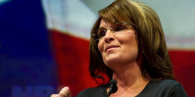 Former Alaska governor and Republican vice presidential candidate Sarah Palin addresses the annual NRA Convention May 3, 2013 in Houston, Texas. In speaking about the tobacco restrictions New York City's Mayor Michael Bloomberg wants to put in place, Palin brought out a tin of smokeless tobacco, much like she did when Bloomberg banned 32 ounce sugared drinks. AFP PHOTO / Karen BLEIER (Photo credit should read KAREN BLEIER/AFP/Getty Images)