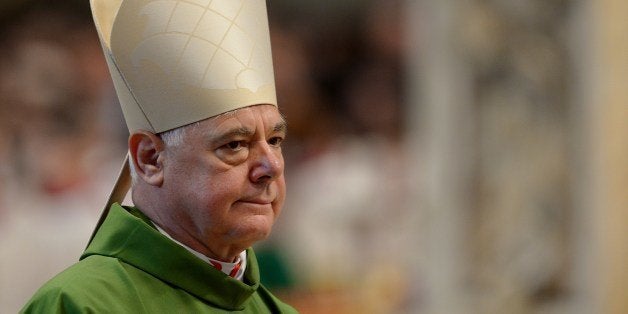 German cardinal Gerhard Ludwig Muller is seen during the holy mass presided by pope Francis in St Peter's basilica at the Vatican on February 23, 2014. Pope Francis create his first batch of cardinals, with 19 coming from South America, Africa and Asia. The new 'princes of the Church' with scarlet-red birettas and gold rings at a grandiose ceremony in St. Peter's Basilica that Vatican observers say should help correct a perceived bias towards European cardinals. AFP PHOTO / VINCENZO PINTO (Photo credit should read VINCENZO PINTO/AFP/Getty Images)