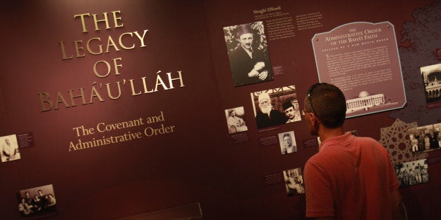 HAIFA, ISRAEL - JULY 14: A visitor learns about Bah?'u'll?h, the 19th century Persian founder of the Bahai faith, in the visitors' center in the Bahai gardens July 14, 2008 in Haifa, Israel. The world spiritual center of the Bahai faith, whose devotees number less than six million worldwide, was declared a World Heritage Site by UNESCO last week. (Photo by David Silverman/Getty Images)