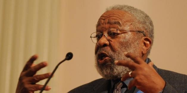 Dr Vincent Harding who was a close colleague and speech writer for Dr Martin Luther King, speaks during a service at the All Souls Church to commemorate his birthday in Washington on January 19, 2009. Barack Obama called on a nation reeling from economic crisis and war to march together in the spirit of Martin Luther King, hours before being sworn in as America's first black president. 'Tomorrow, we will come together as one people on the same mall where Dr King's dream echoes still,' Obama said in a statement, paying tribute to the slain civil rights hero on the national holiday commemorating King's birth. AFP PHOTO/Mark RALSTON (Photo credit should read MARK RALSTON/AFP/Getty Images)