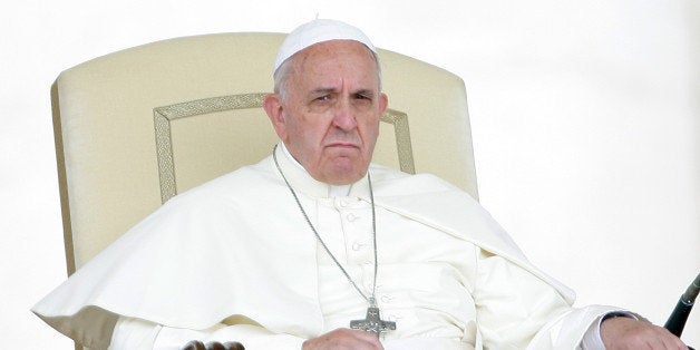 VATICAN CITY, VATICAN - MAY 28: Pope Francis attends his weekly audience in St. Peter's square on May 28, 2014 in Vatican City, Vatican. Pope Francis during his General Audience spoke about his recent visit to the Holy Land. He said his journey was meant to renew a commitment to work for Christian unity but also to encourage efforts to work for peace and reconciliation in the Middle East. (Photo by Franco Origlia/Getty Images)