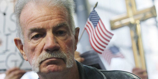 NEW YORK - NOVEMBER 16: Controversial Florida pastor Terry Jones stands at a small protest at the site of the Park 51 proposed mosque and community center November 16, 2010 in New York City. Jones threatened to burn a Koran on September 11 to protest the so-called 'Ground Zero mosque' but eventually reconsidered. (Photo by Mario Tama/Getty Images)