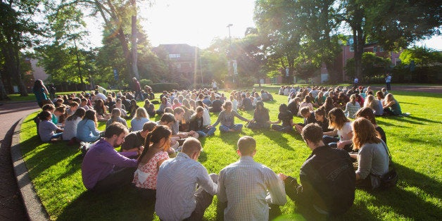 SEATTLE, WA - JUNE 05: Students mourn on campus after a shooting at Seattle Pacific University on June 5, 2014 in Seattle, Washington. A gunman is in custody after four people were shot on campus resulting in one death. (Photo by Mat Hayward/Getty Images)