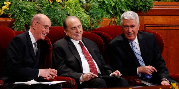 SALT LAKE CITY, UT - APRIL 5: President Thomas Monson, (C), First Counselor Henry Eyring, (L) and Second Counselor Dieter Uchtdorf (R), talk before the start of the second session of the 184th annual general conference of The Church of Jesus Christ of Latter Day Saints, Mormons, on April 5, 2014 in Salt Lake City, Utah. Thousands of Mormons from around the world gather for the two day conference to hear instruction from leaders of the church. (Photo by George Frey/Getty Images)