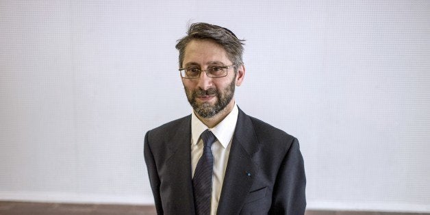 The newly elected 'Great Rabbi of France' Haim Korsia, poses for a photograph on June 22, 2014, in Paris. Korsia, 51, was elected by a Jewish council to serve as the designated 'Great Rabbi of France' for the upcoming years. AFP PHOTO / FRED DUFOUR (Photo credit should read FRED DUFOUR/AFP/Getty Images)