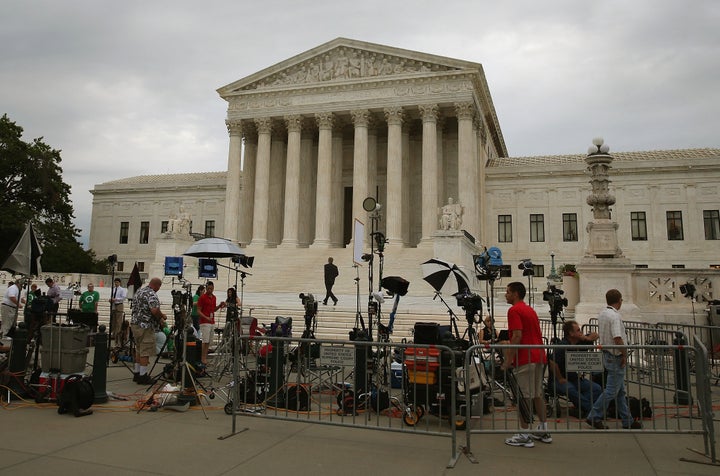 WASHINGTON, DC - JUNE 30: Media of the media are set up in front of the U.S. Supreme Court, June 30, 2014 in Washington, DC.
