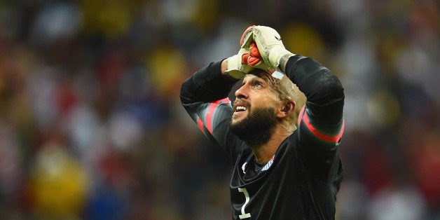 SALVADOR, BRAZIL - JULY 01: Tim Howard of the United States reacts during the 2014 FIFA World Cup Brazil Round of 16 match between Belgium and the United States at Arena Fonte Nova on July 1, 2014 in Salvador, Brazil. (Photo by Jamie McDonald/Getty Images)