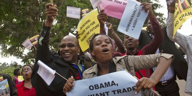 Anti-homosexuality activists march through the streets of Ugandan capital, Kampala on March 31, 2014 in support of the govern