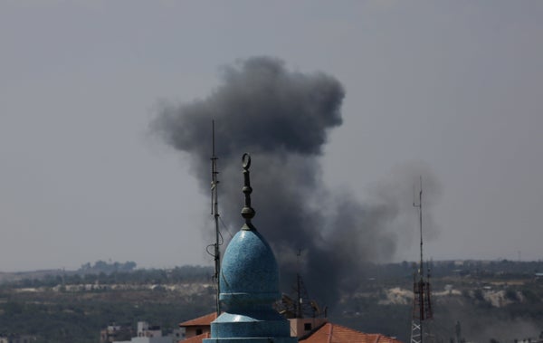 Smoke rises after an Israeli missile strike in Gaza City, Monday, July 14, 2014. 